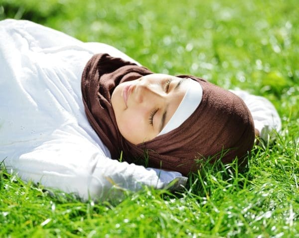 Muslim woman sleeping chronic pain and sleep debt