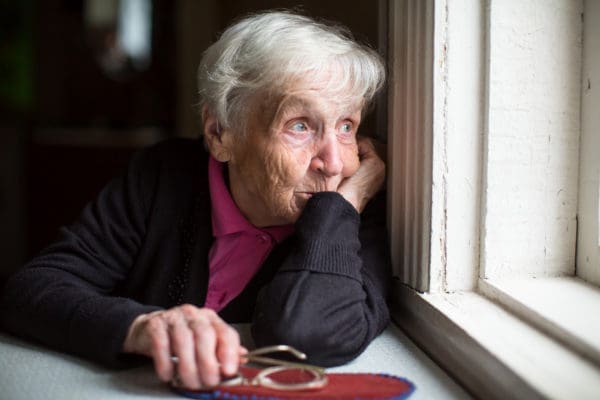 senior woman cope with Alzheimer's